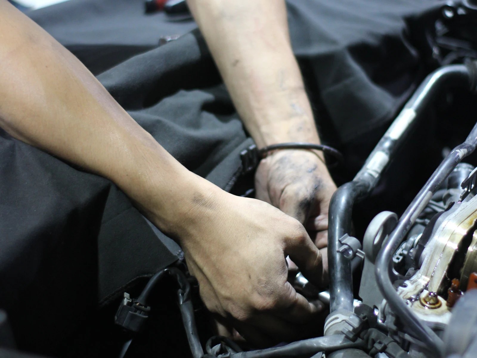 SAG technician working on a vehicle